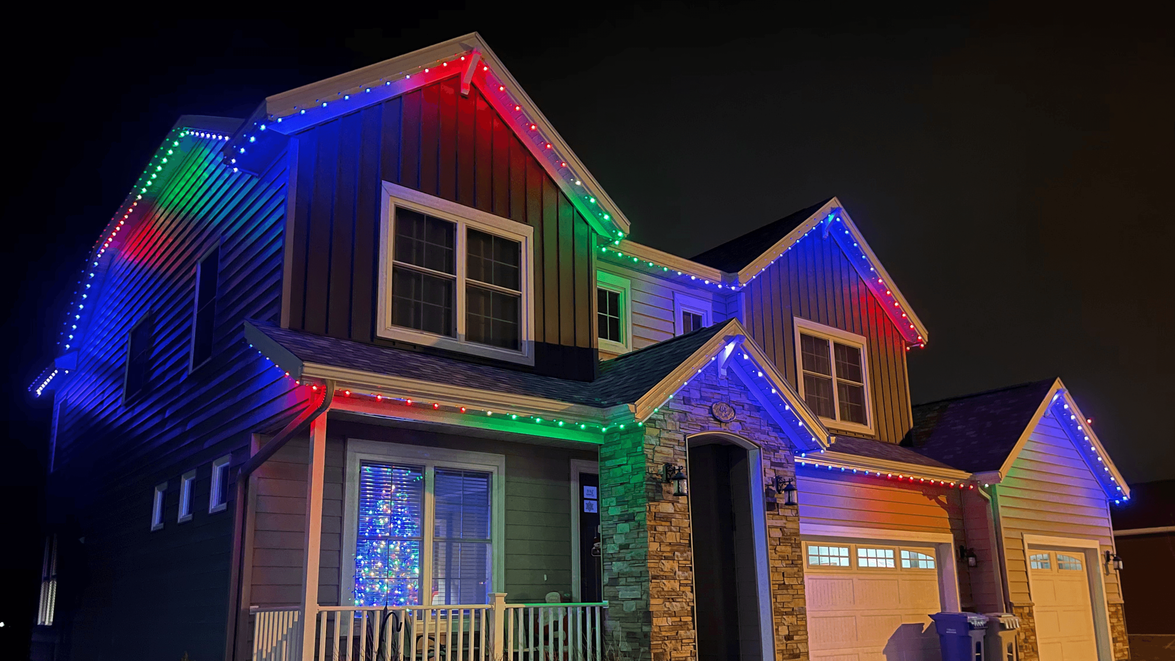 Multi-color permanent Trimlight LED system on residential home in Waseca, Minnesota